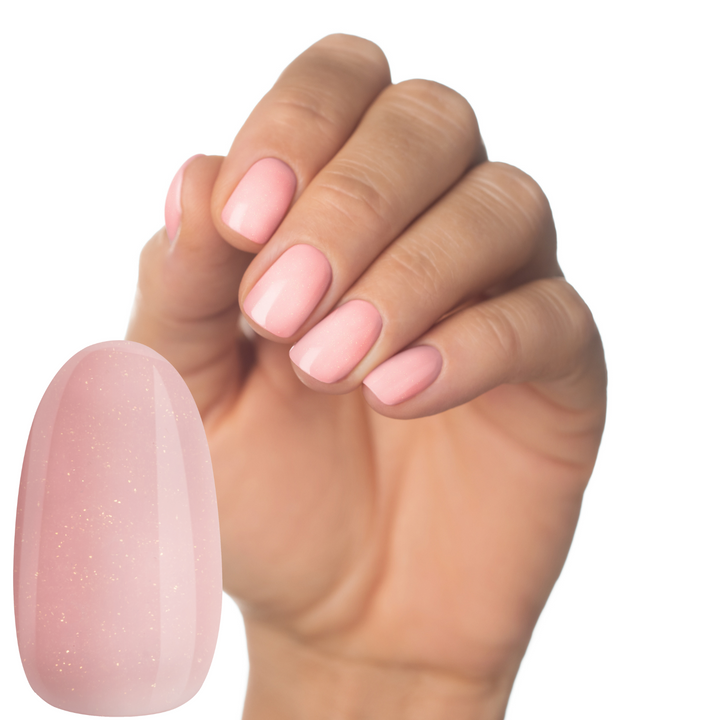 Luminary Bliss pink gel polish with gold shimmer in 10ml bottle
