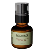 Bronsun Professional Color Fixing Lotion in an amber glass bottle with a black pump dispenser and a beige label.