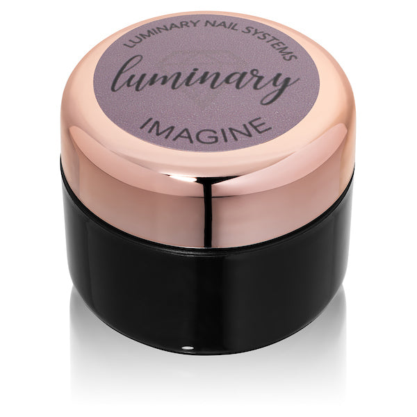 Luminary nail system container with rose gold lid and black body on a white background
