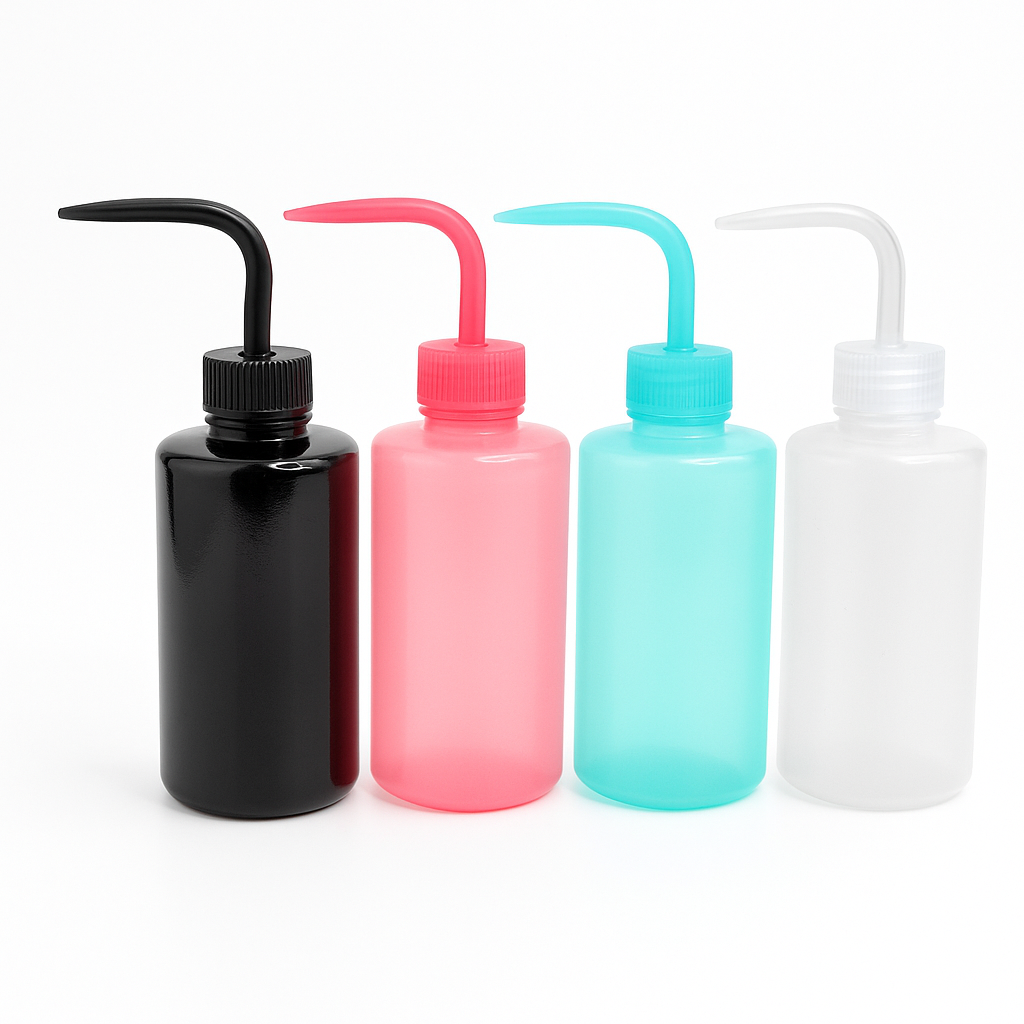 Four squeeze bottles with different colored nozzles for lash wash bottles