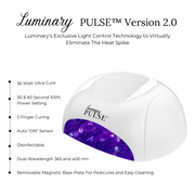 A white and purple Luminary Pulse Version 2.0 LED nail curing light with a removable magnetic base plate.