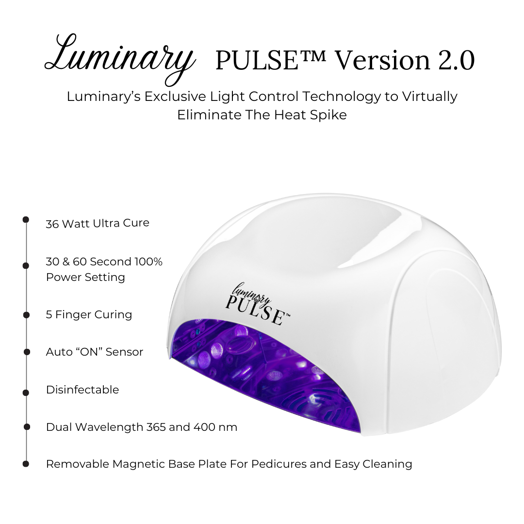 A white and purple Luminary Pulse Version 2.0 LED nail curing light with a removable magnetic base plate.