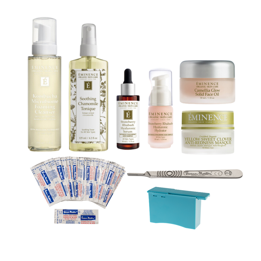 A collection of skin care products and tools including facial cleanser, tonique, solid face oil, anti-redness masque, hyaluronic serum, moisturizer, exfoliating peel, and a dermaplaning kit with blades and a handle.